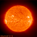 Real NASA animation of our sun with orange filter taken the week of 8/2/04. Click for larger view (1628K)